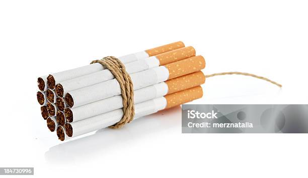 Cigarettes Tied With Rope And Wick Isolated On White Stock Photo - Download Image Now