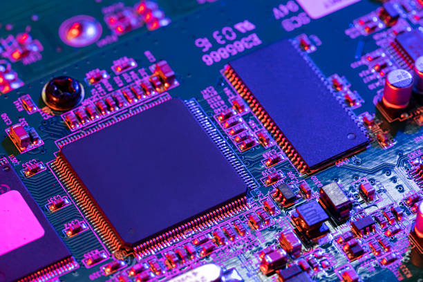 istock Electronic circuit board close up. Background with digital circuit board. Blue-violet PCB. 1847313284