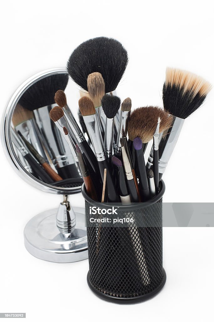 makeup brushes Makeup brush set and stylish mirror Adult Stock Photo