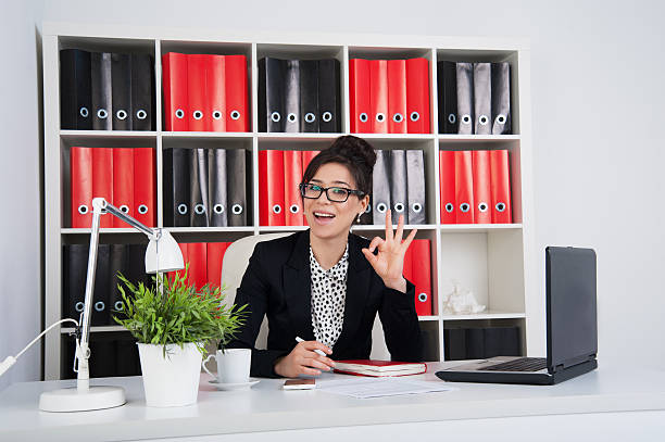 istock business woman in office 184734364