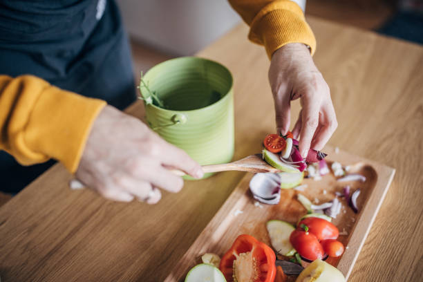 istock Domestic Couple Preparing Meal Together 1847347734