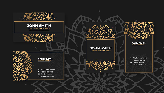 Luxury black business card with golden mandala decoration designs, Bright floral ornamental elements
