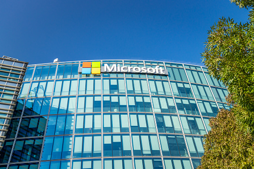 Issy-les-Moulineaux, France - September 09, 2023 : Microsoft emblem displayed on the French corporate head office in Issy les Moulineaux near Paris, France