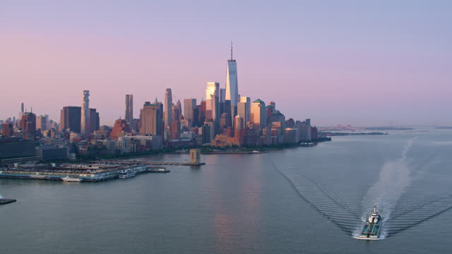 AERIAL Approaching the New York Financial District at sunrise