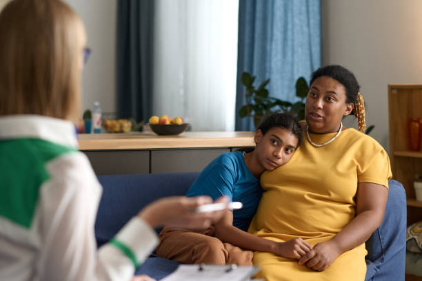 istock Social worker talking to adoptive parent 1847406740