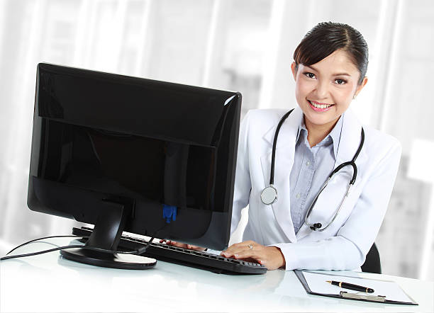 istock doctor woman in the office 184740678