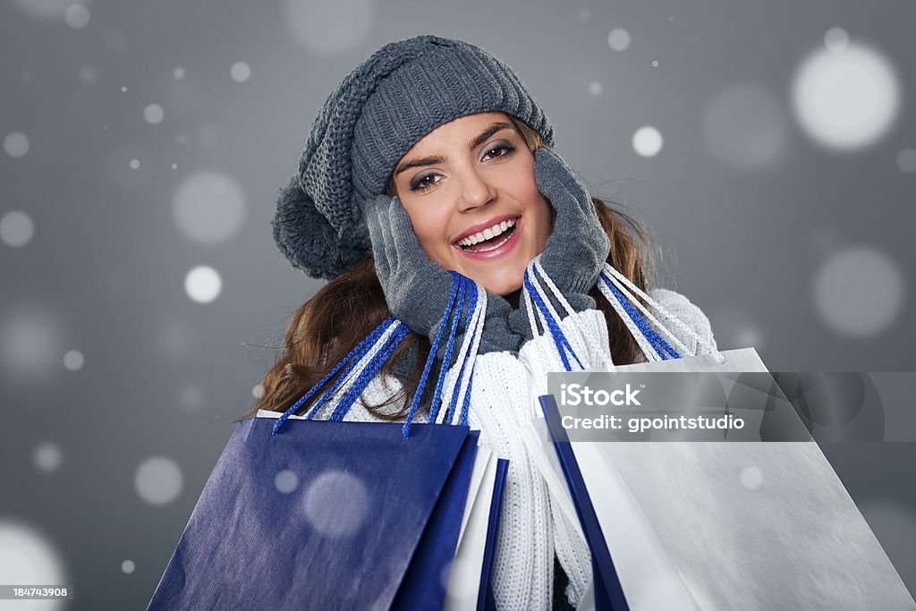 Magic and successful shopping in winter season One Woman Only Stock Photo