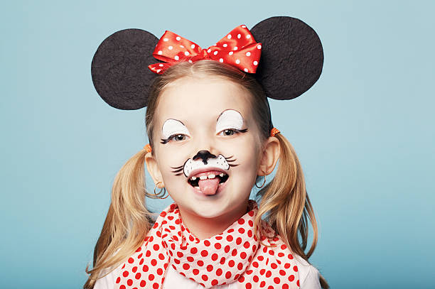 istock little girl with mouse mask 184744799