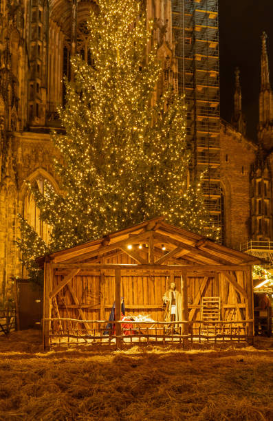 Ulm, Germany, December 2023: Nativity Scene in front of Ulm Minster