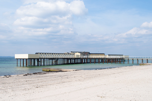 Public cold water swimming bath house in Helsingborg, where people go for cold water dips, have a sauna and relax. The building was destroyed in a storm and rebuilt in 2015