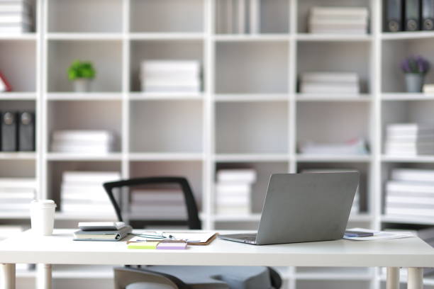 istock Desk with laptop and documents in the office. 1847473208