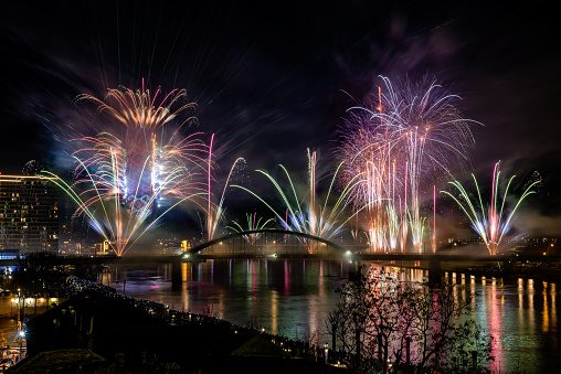 Beautiful New Years firework over business district Belgrade Waterfront on the river Sava in Serbia.