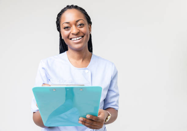 istock Female Medical Worker with a Clipboard 1847500718
