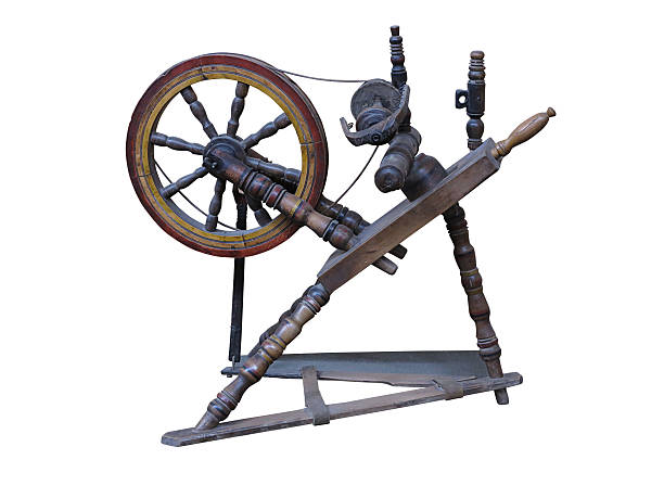 istock Old manual wooden spinning-wheel distaff isolated on white 184750483