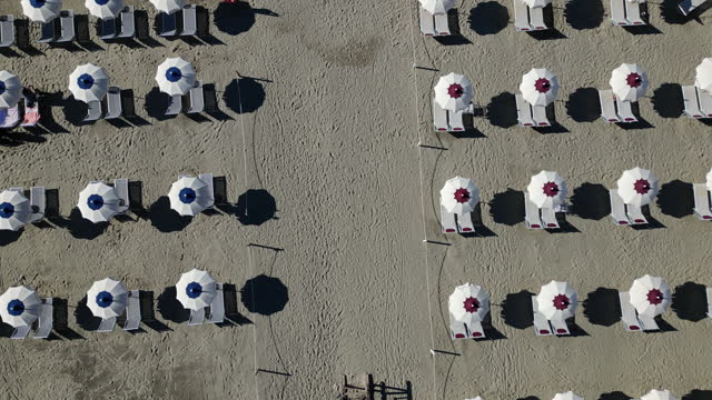 Aerial view of many beach umbrellas on the beach