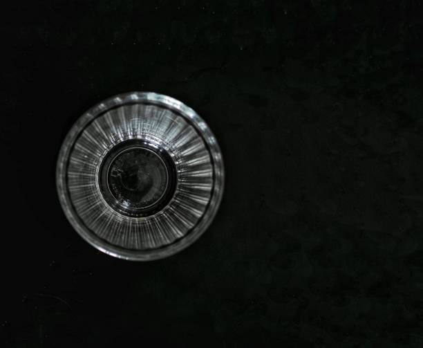 istock Top view of a glass on a black surface 1847551266