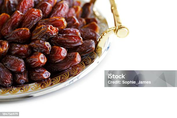 Dried Arabic Dates Presented On An Ornate Tra Stock Photo - Download Image Now - Arabia, Arabic Script, Arabic Style