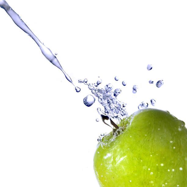 istock fresh water splash on green apple isolated 184757377