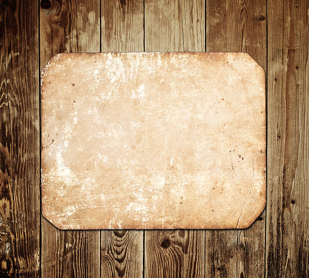 istock Paper on wood background 184757839