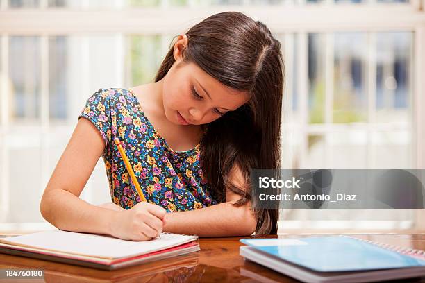 Focused On Homework Stock Photo - Download Image Now - Beautiful People, Beauty, Brown Hair