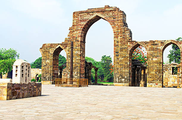 istock Iron Pillar and Qutab Minar Ruins Delhi India 184760755