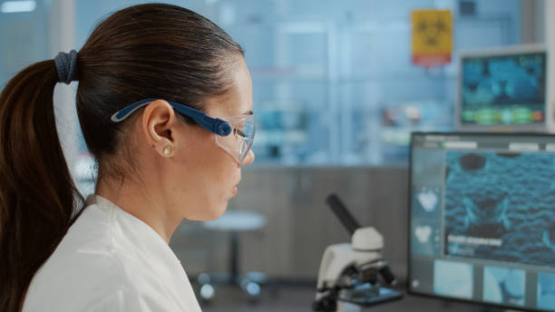 istock Biology specialist working with computer to examine dna animation 1847615351