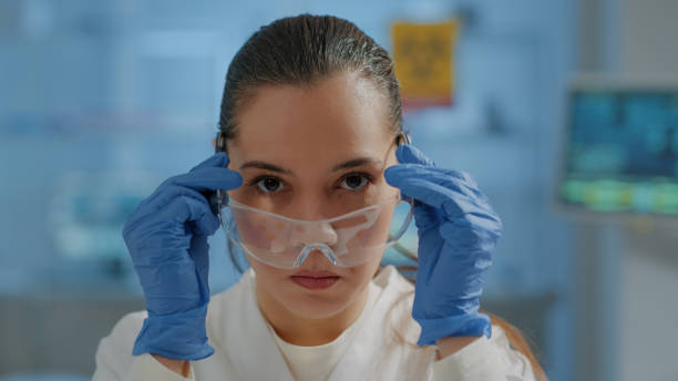 istock Scientist putting safety glasses on for protection 1847631303