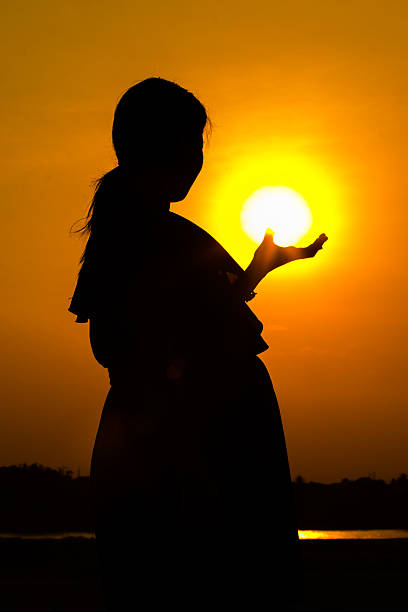 istock pregnant woman silhouette 184764037