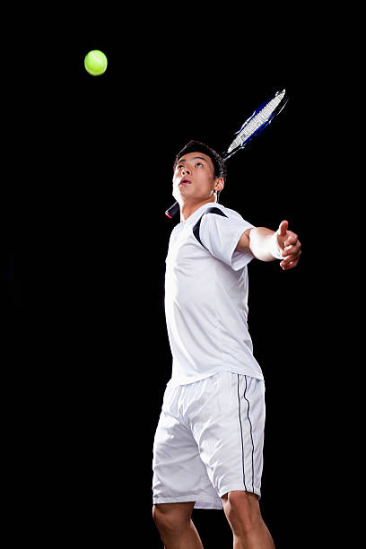istock Tennis player ready to hit ball, portrait 184764559