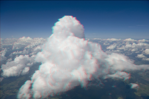 View anaglyph with red/cyan glasses. Taken from a commercial flight.