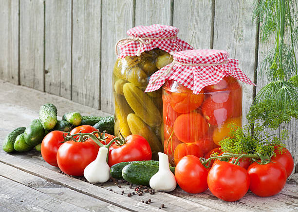 istock canned tomatoes and pickled cucumbers 184764869