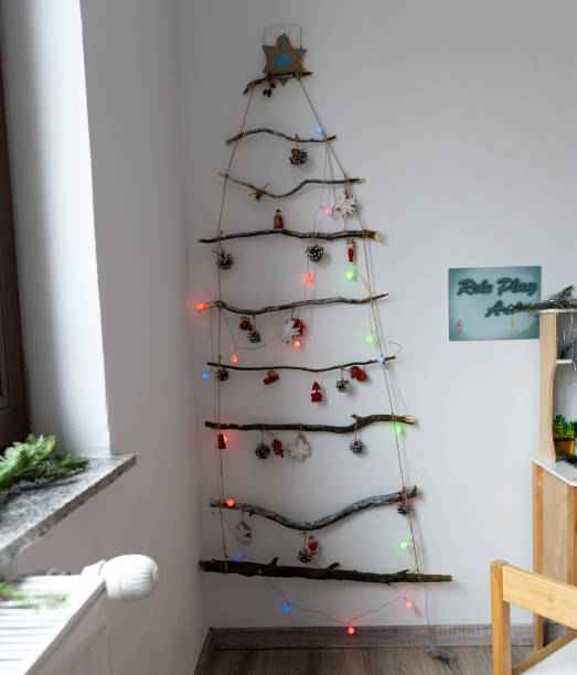 istock Diy christmas tree on the wall with lights 1847655736