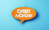White Cyber Monday Writings on Orange Note Paper Hanging on a Rope on Blue Soft Background