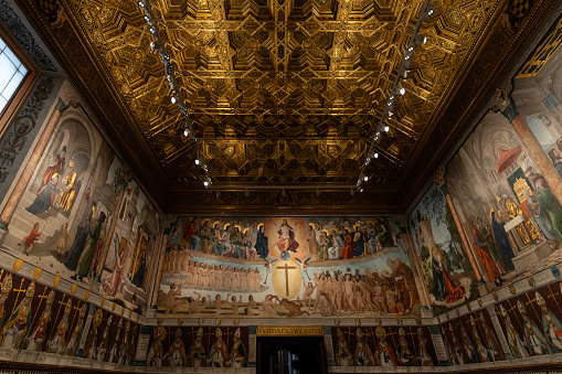 Toledo, Spain - March 18, 2023: Chapter room of the Cathedral of Santa Maria in Toledo, Spain, filled with art to celebrate the extraordinary meetings of its Chapter. UNESCO World Heritage Site