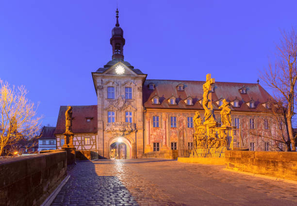 Old town hall or Altes Rathaus and Upper Bridge in Old town at blue hour, Bamberg, Bavaria, Germany
