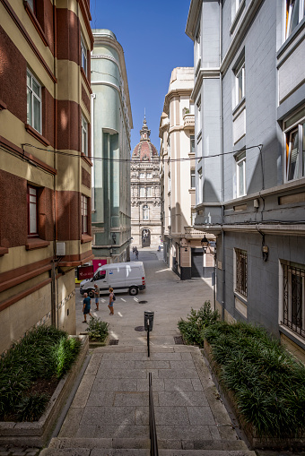 View through narrow street of the Town hall in Maria Pita Sqaure in A Coruna, Galicia, Spain on 22 August 2023