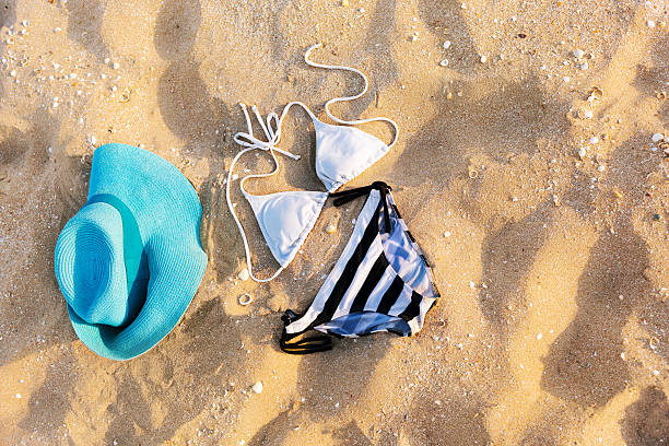 istock swimsuit in the sand 184773475