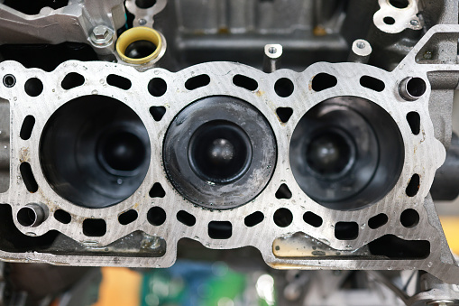 disassembling, maintaining, and repairing the parts of an automotive engine.