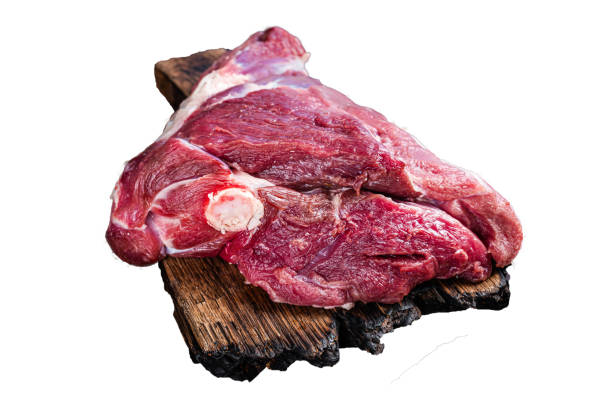 istock Raw lamb mutton thigh on butcher table. Isolated, white background. 1847760257