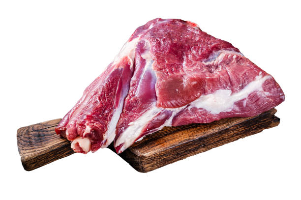 istock Raw lamb mutton thigh on butcher table.  Isolated, white background. 1847760269