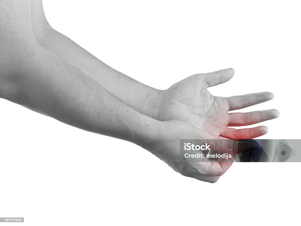 Pain in a man finger Pain in a man fingere. Male holding hand to spot of finger-ache. Adult Stock Photo