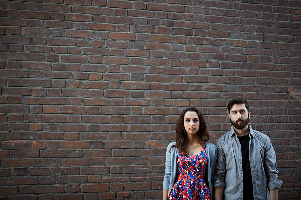 istock Couple by the brick wall 184779307