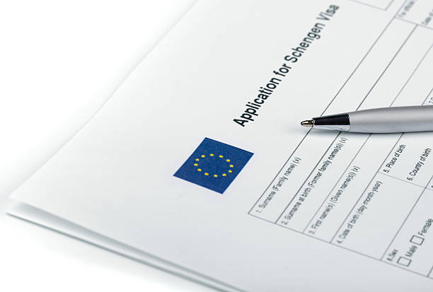 Applicatoin for Schengen Visa Blank applicatoin for Schengen Visa and pen schengen agreement photos stock pictures, royalty-free photos & images