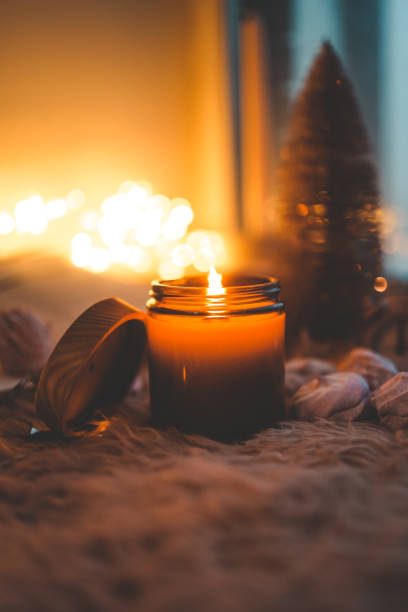 istock Burning candle in a festive cozy atmosphere 1847820106