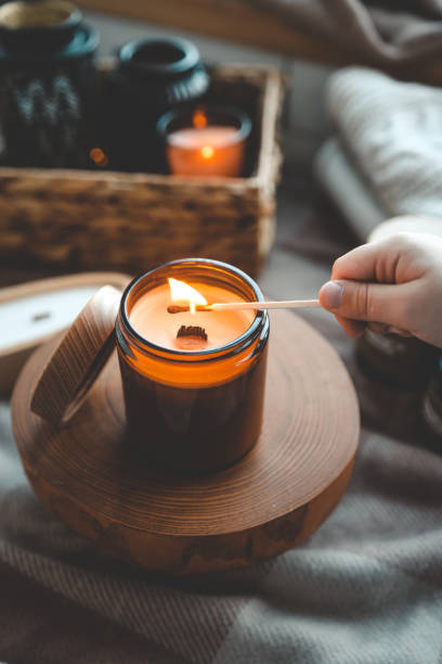 istock Match in hand lighting candles, aesthetics 1847820118