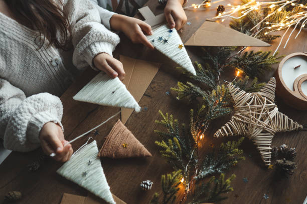 istock Children make Christmas decorations from yarn, activity idea 1847822970