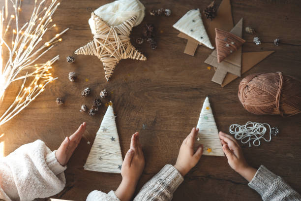 istock Children making Christmas decorations from yarn 1847823498