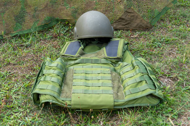 istock Green bulletproof vest and military helmet 1847826228