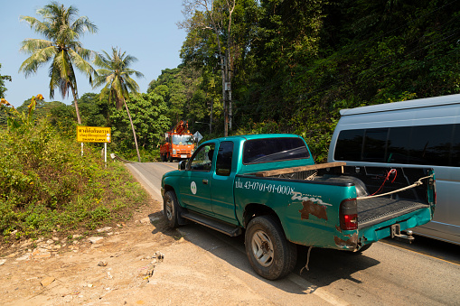 Thailand - Jan 15, 2020: Traffic on a dangerous stretch of road that bypasses the island of Koh Chang in the Gulf of Thailand
