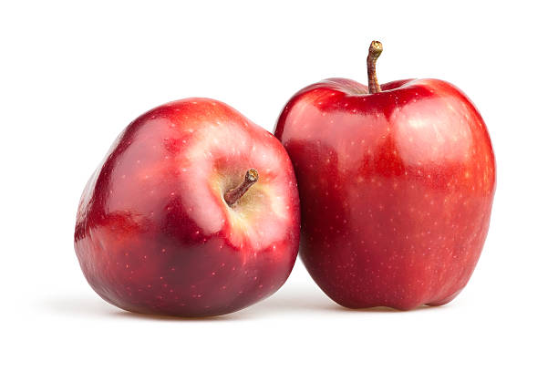 apple red zwei - red delicious apple red gourmet apple stock-fotos und bilder